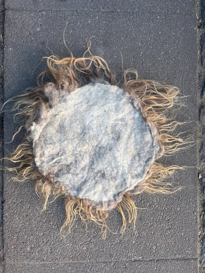 Wet-felted seat cushion