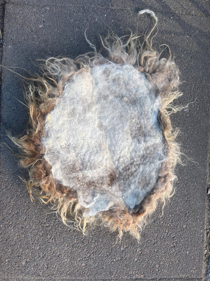 Wet-felted seat cushion