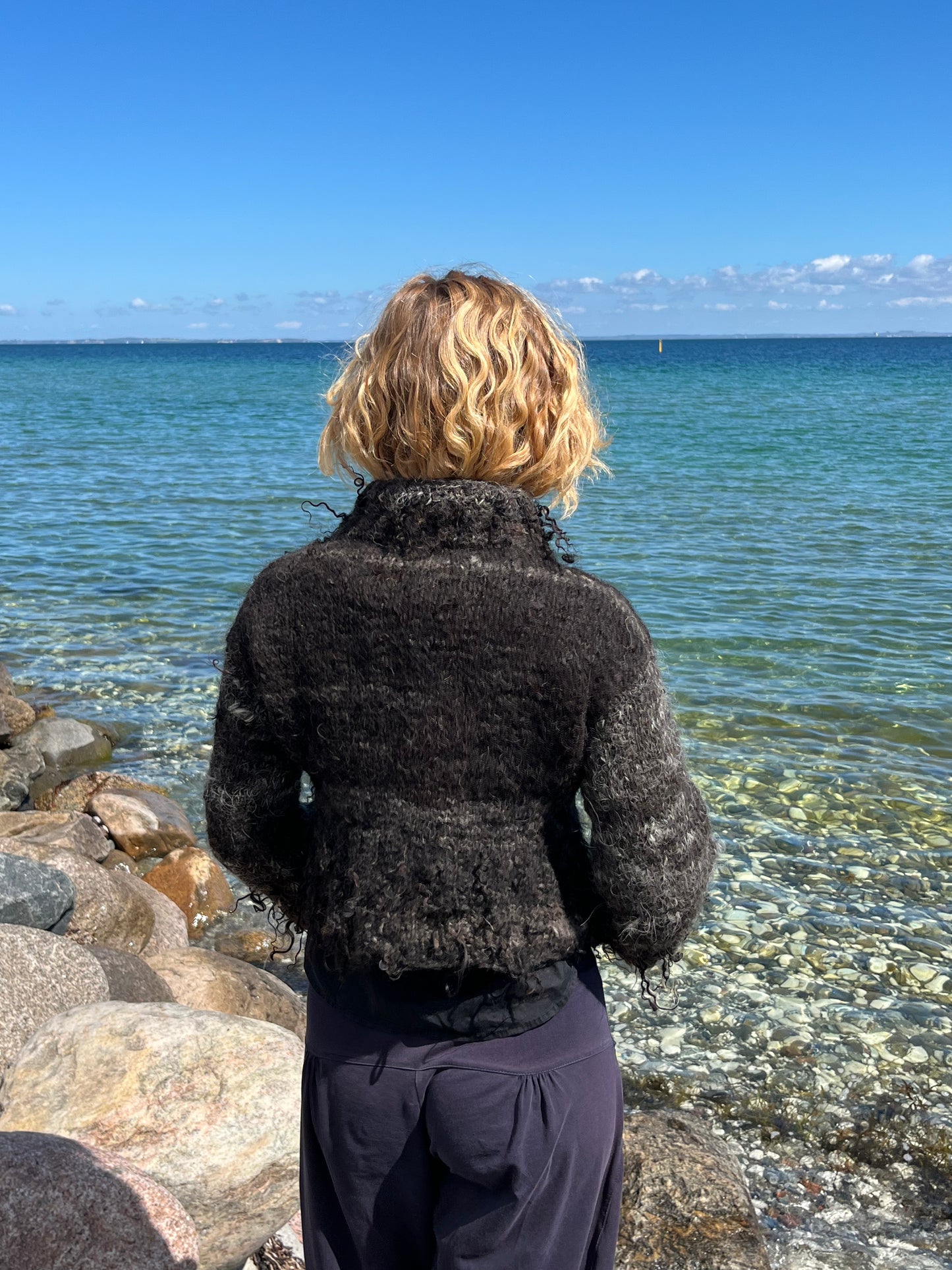 Dogmestrikket krøllet sweater