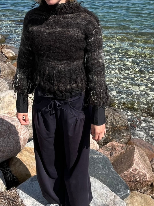Dogmestrikket krøllet sweater