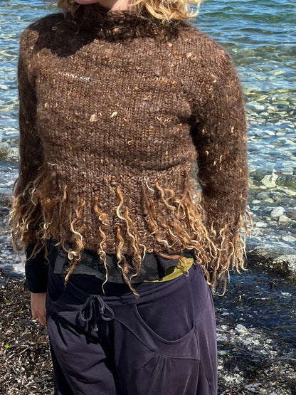 Dogmestrikket krøllet sweater