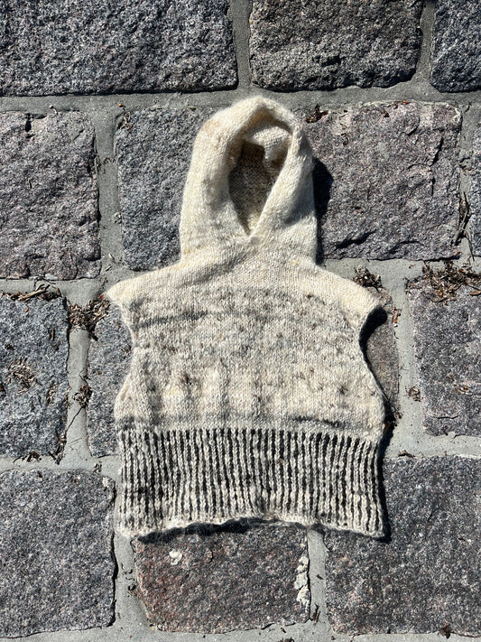 Dogma-knitted striped vest with hood