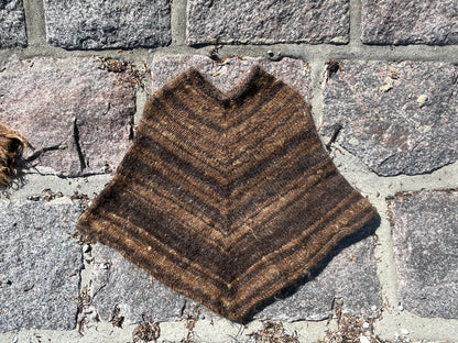 Dogmestrikket poncho
