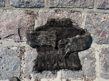 Dogmestrikket krøllet sweater